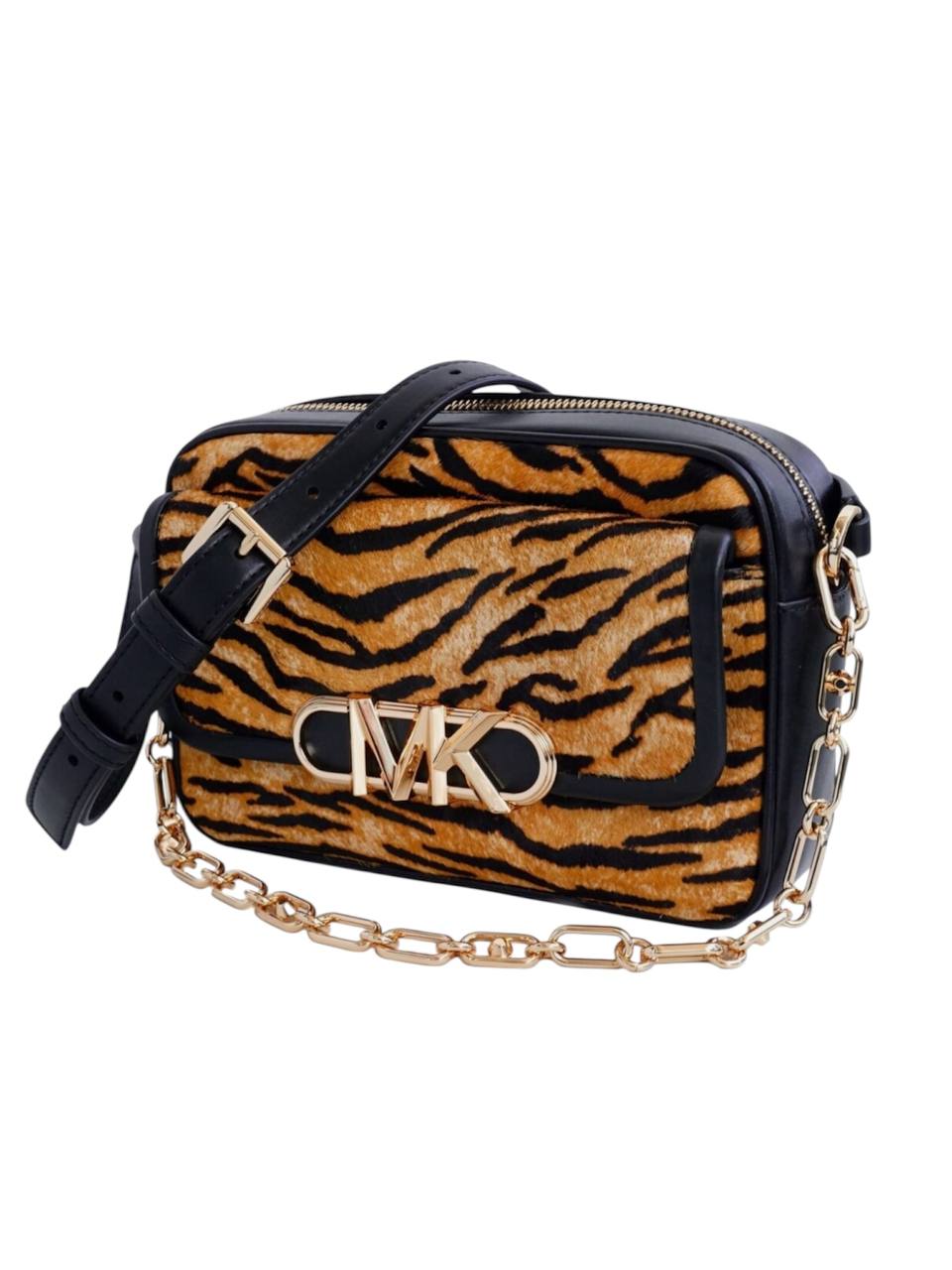 Designer handbag with tiger stripe pattern and gold chain detail on a white background, Michael Kors, Monza Outlet, Monza Fashion, Shein Outlet