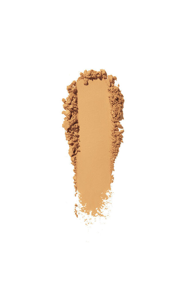 Pile of brown powder on a white background Monza fashion outlet, monza outlet, shein outlet, shien outlet cosmetics, makeup, perfume