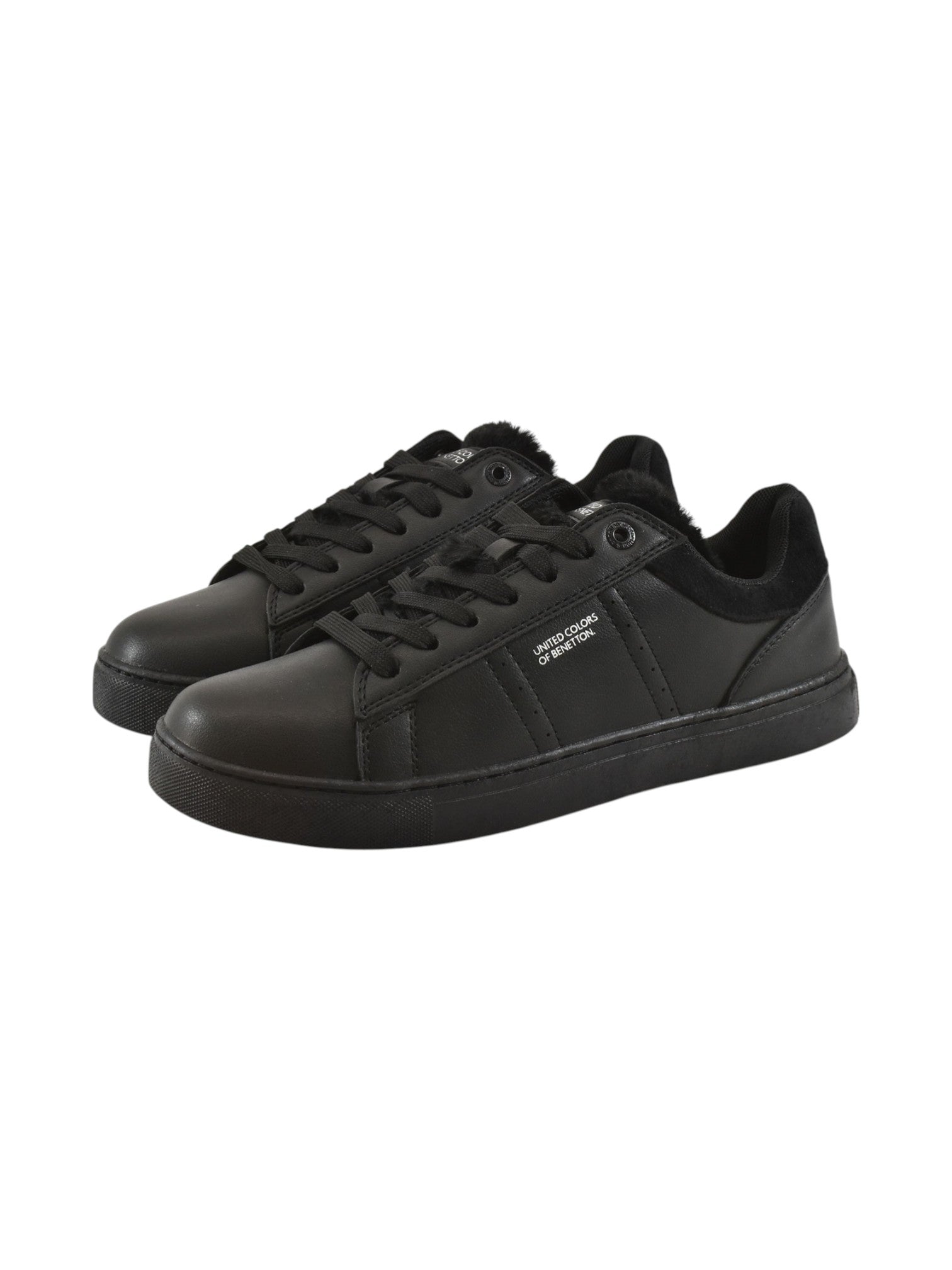 Pair of black sneakers on a white background. United Colors of Benetton, Monza Outlet, Monza Fashion, Shein Outlet