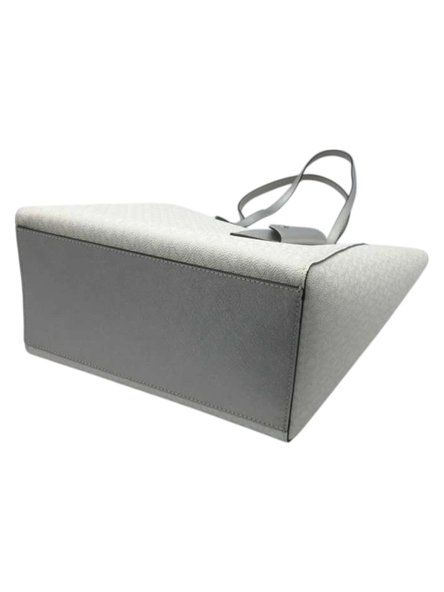 Gray fabric ottoman with a handle on a white background Michael Kors Monza Outlet