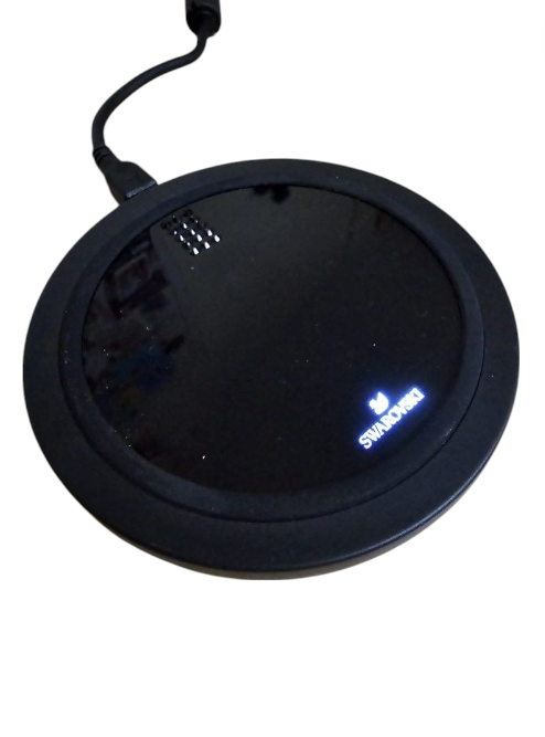 Black wireless charging pad with Smartronic branding on a white background, Swarovski, Monza Outlet, Monza Fashion, Shein Outlet