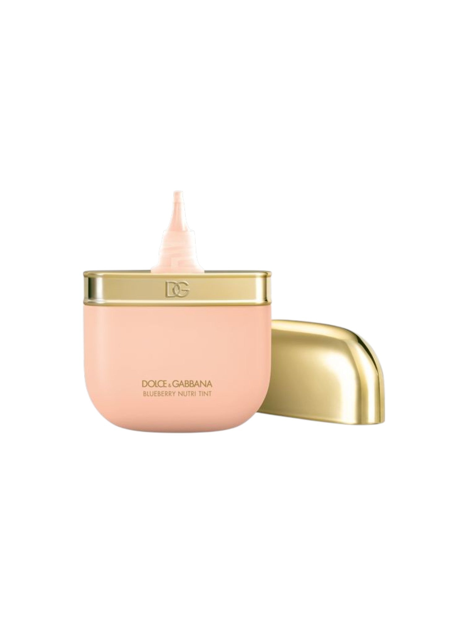 A peach colored cosmetic jar with a gold metallic rim and a matching gold cap lying beside it on a plain white background. The front of the jar shows the text D. Dolce & Gabbana, Monza Outlet, Monza Fashion, Shein Outlet