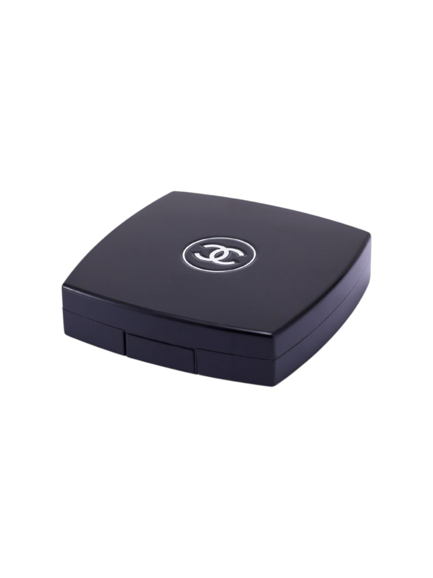 Black makeup compact with Chanel logo on a white background monza outlet, Shein outlet, monza fashion