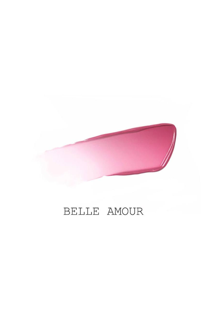 Swatch of Pat McGrath Labs Lip Fetish Divinyl Lip Shine in the shade Belle Amour, showing a slightly warm-toned, deep pink color with a luminous finish. Monza Outlet