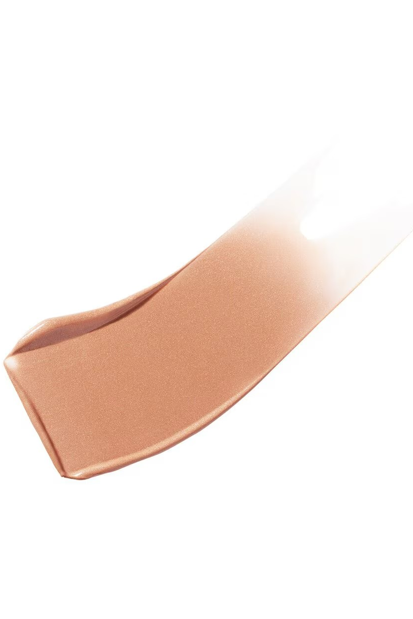 Close-up of a beige makeup product on a white background Monza fashion outlet, monza outlet, shein outlet, shien outlet cosmetics, makeup, perfume