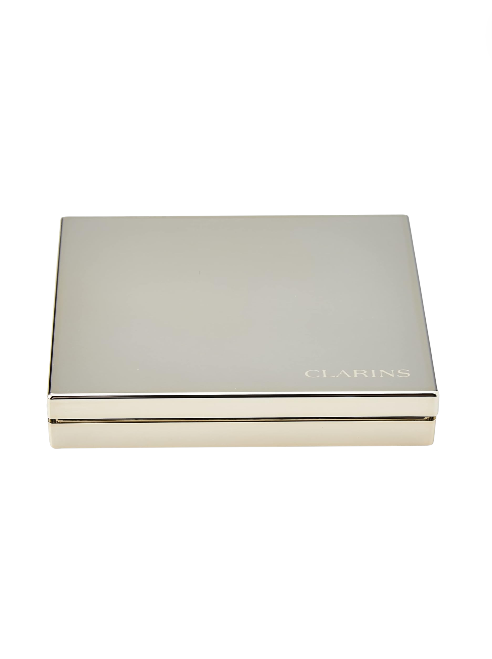 Silver makeup palette with 'Clarins' branding on a white background monza outlet, Shein outlet, monza fashion