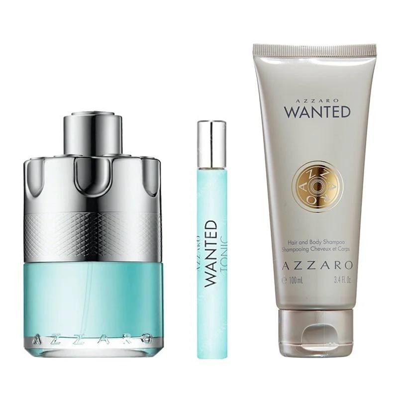 Azzaro perfume set with a bottle, rollerball, and shampoo on a white background. Monza Outlet
