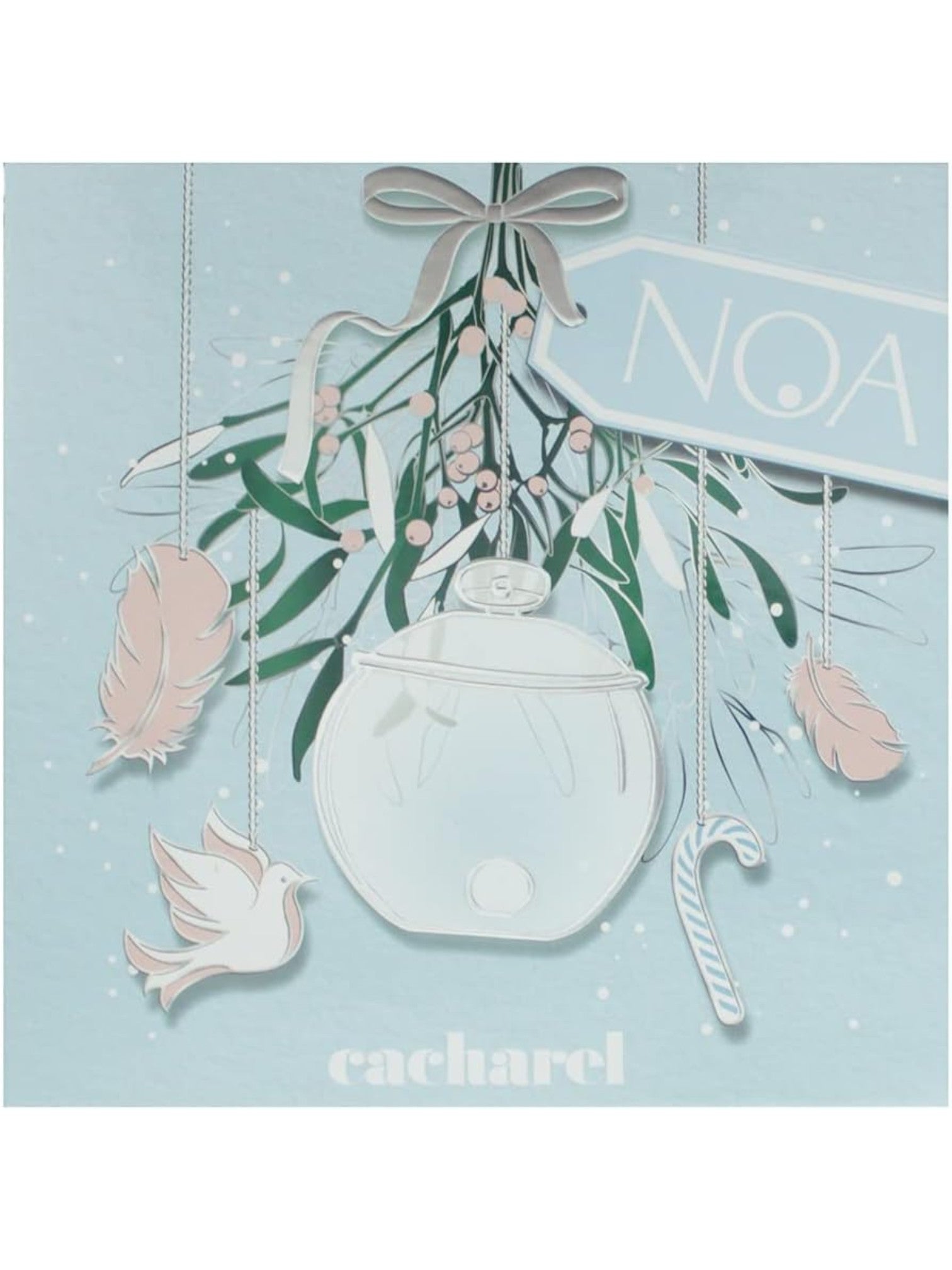Cacharel Noa perfume packaging with mistletoe and dove design on a light blue background. Cacharel Noa, Monza Outlet, Monza Fashion, Shein Outlet