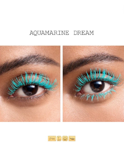 Aquamarine eyelashes on a model's eyes with Aquamarine Dream text above. Pat McGrath Labs Monza Outlet