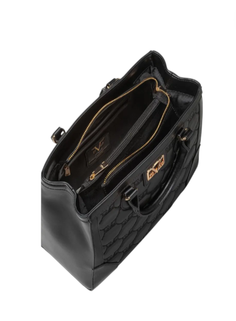 Black quilted handbag with gold accents on a white background monza outlet, Shein outlet, monza fashion