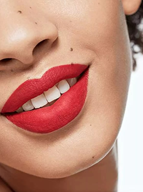 Close-up of a person wearing bright red lipstick with a blurred background Clarins Monza Outlet, Monza Fashion, Shein Outlet