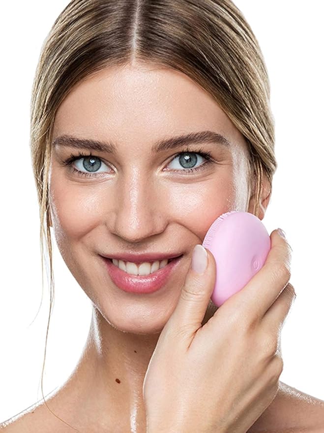 Woman holding a pink beauty blender against a white background Monza outlet, monza fashion, shein outlet, shien outlet