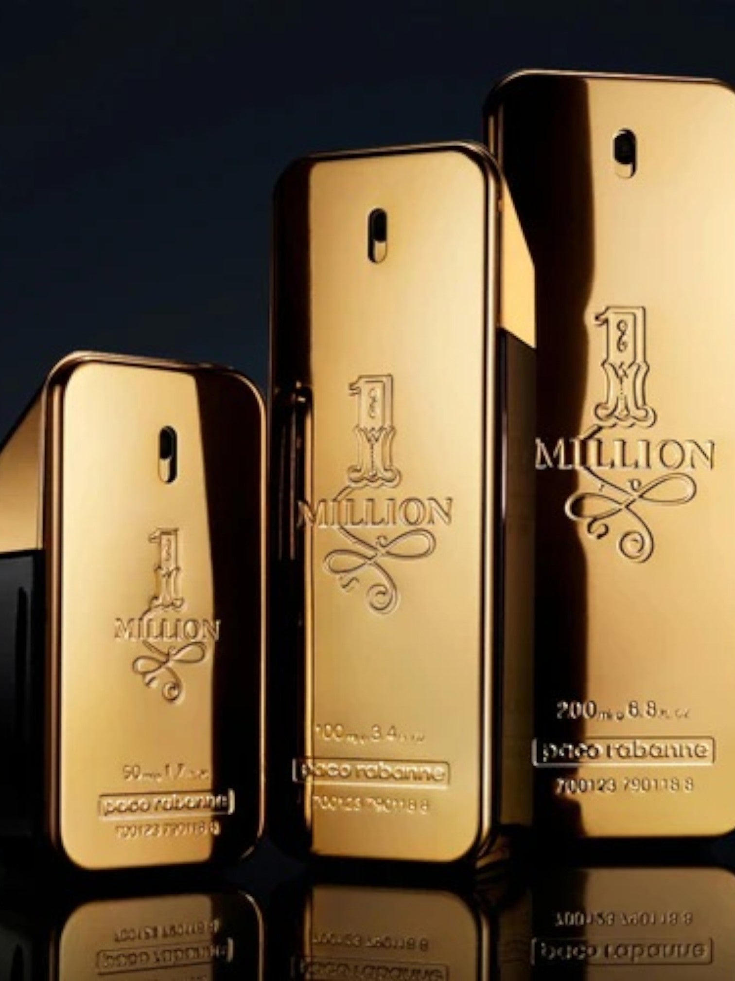 Three gold-colored bottles of Paco Rabanne 1 Million on a dark background. Paco Rabanne, Monza Outlet, Monza Fashion, Shein Outlet