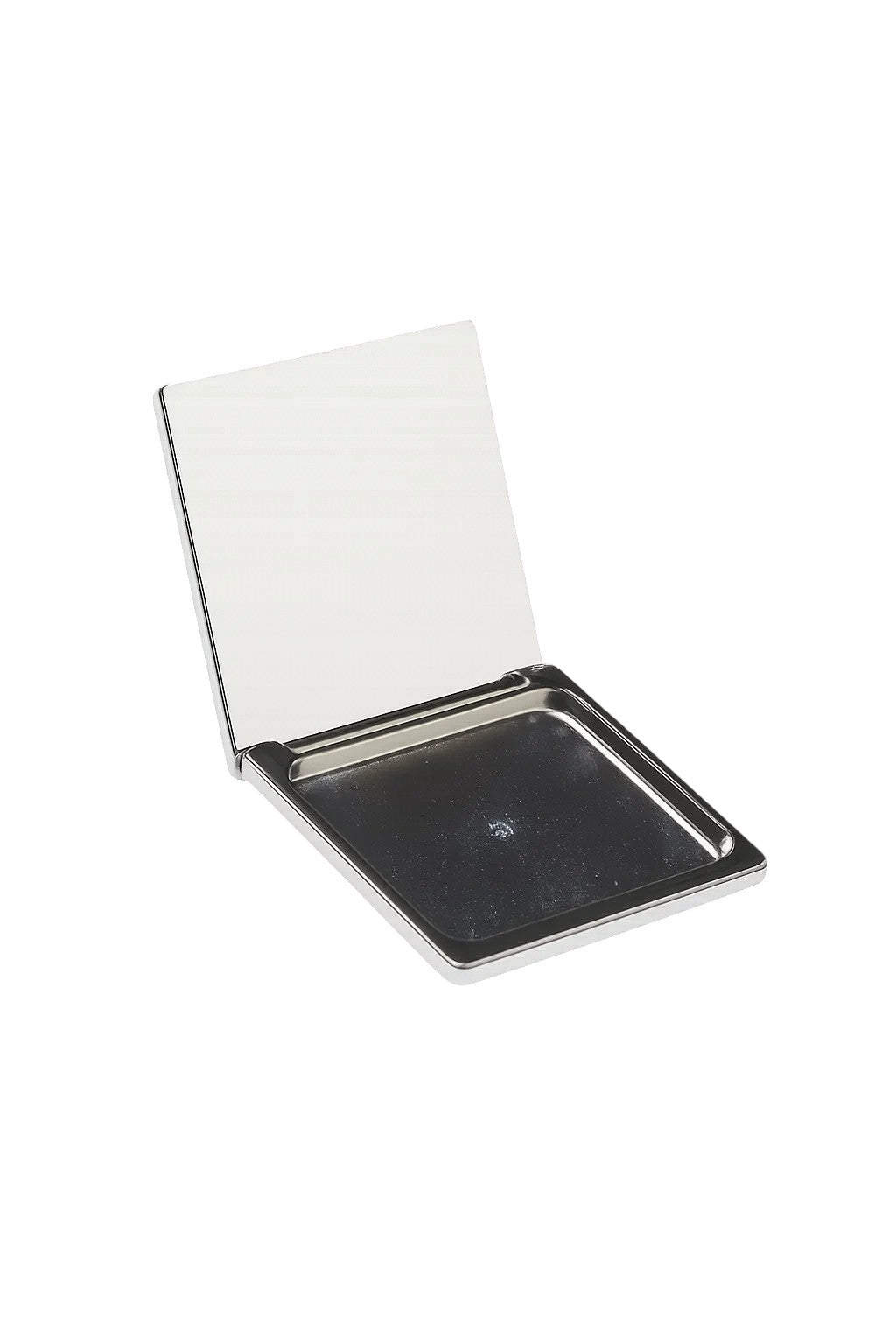 Compact mirror with a black reflective surface on a white background