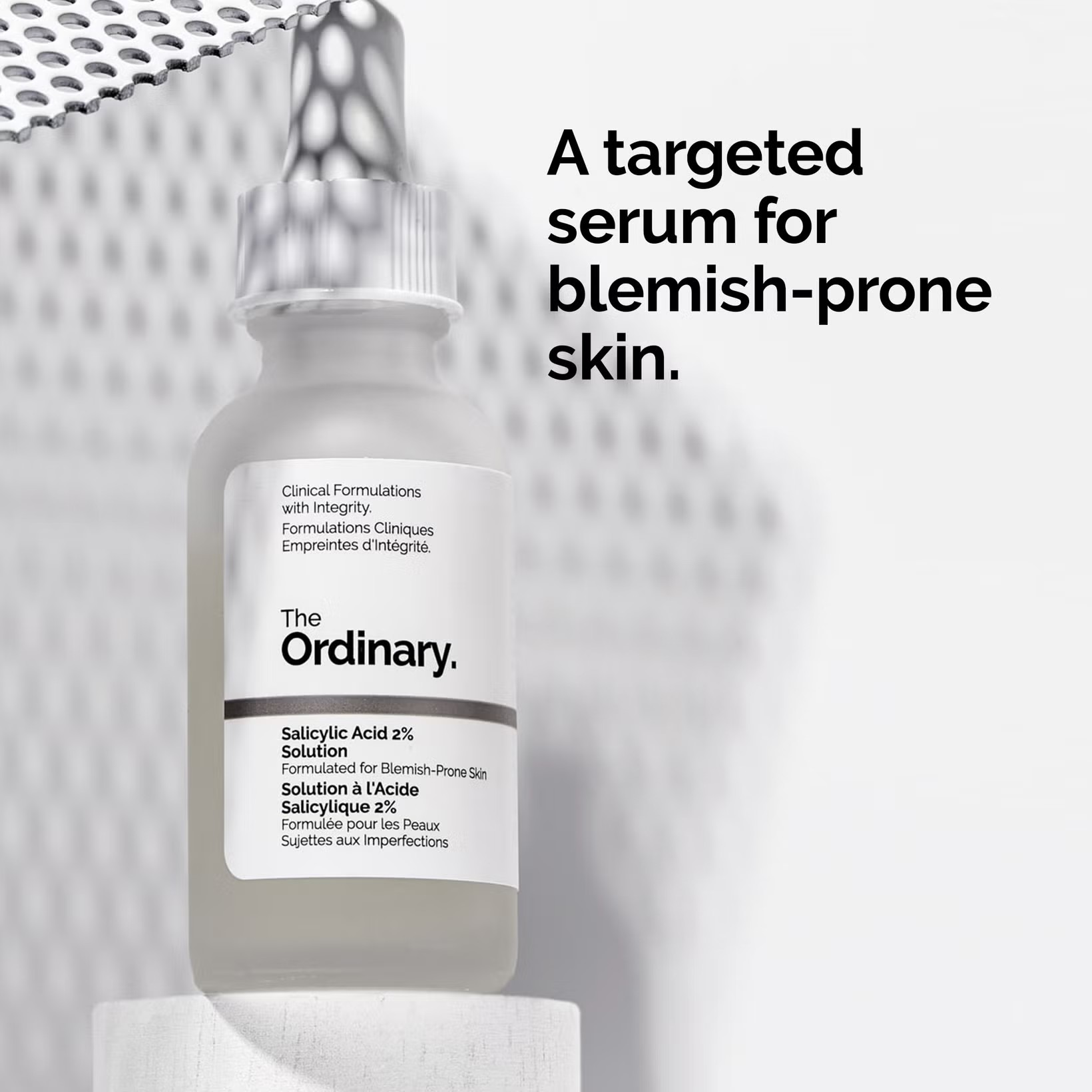 Bottle of The Ordinary Salicylic Acid 2% Solution on a textured white background Monza Outlet