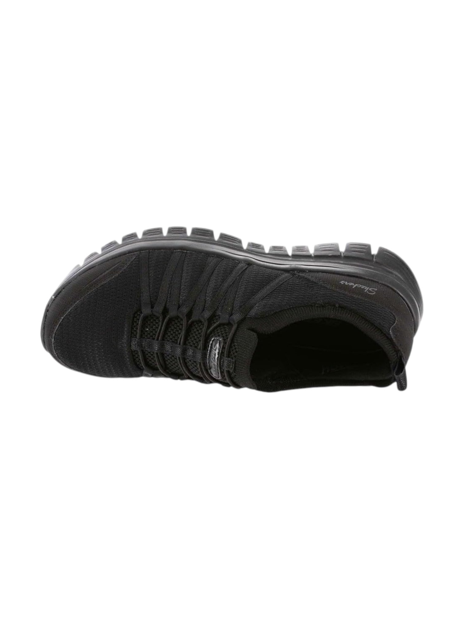 Black slip-on shoe with a textured sole on a white background. Skechers, Monza Outlet, Monza Fashion, Shein Outlet