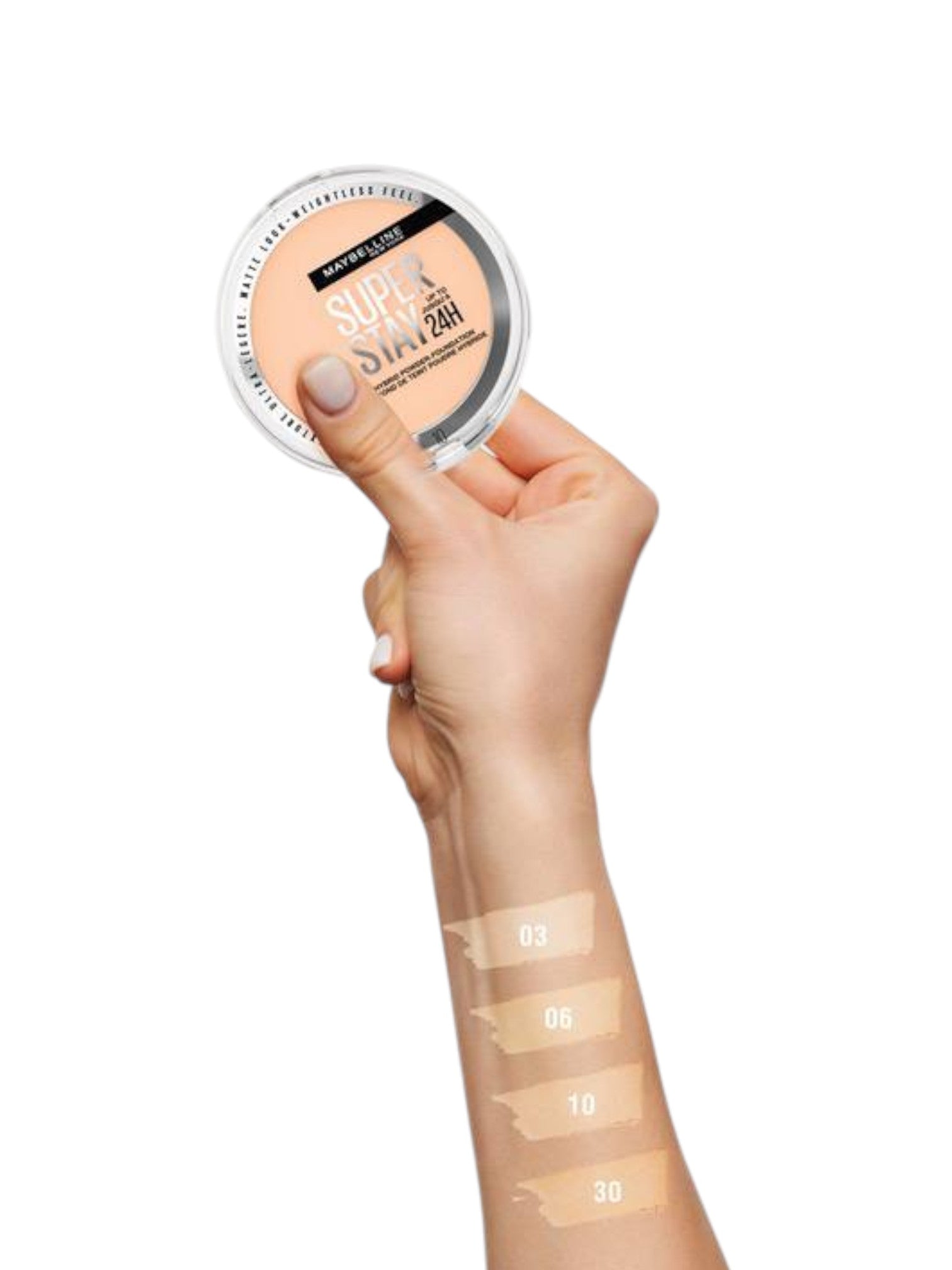 Hand holding a compact powder with color swatches on an arm Maybelline Monza Outlet