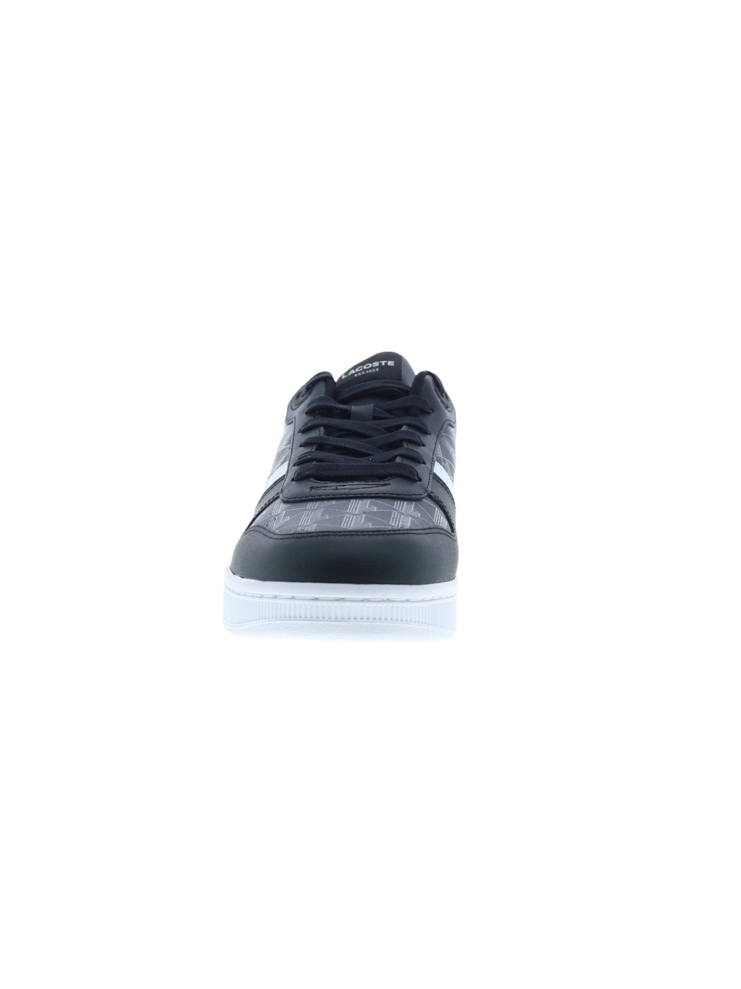 Black sneaker with white sole on a white background Lacoste Monza Outlet