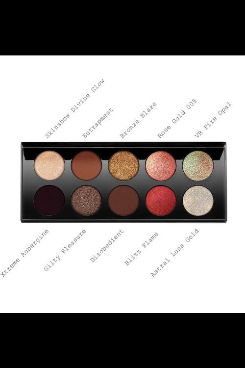 A palette of ten eyeshadows with a variety of finishes including matte, shimmer, and metallic, with shades named Skinshow Divine Glow, Entrapment, Bronze Blaze, Rose Gold 005, VR Fire Opal, Xtreme Aubergine, Gilty Pleasure, Disobedient, Blitz Flame, and Astral Luna Gold. Monza Outlet