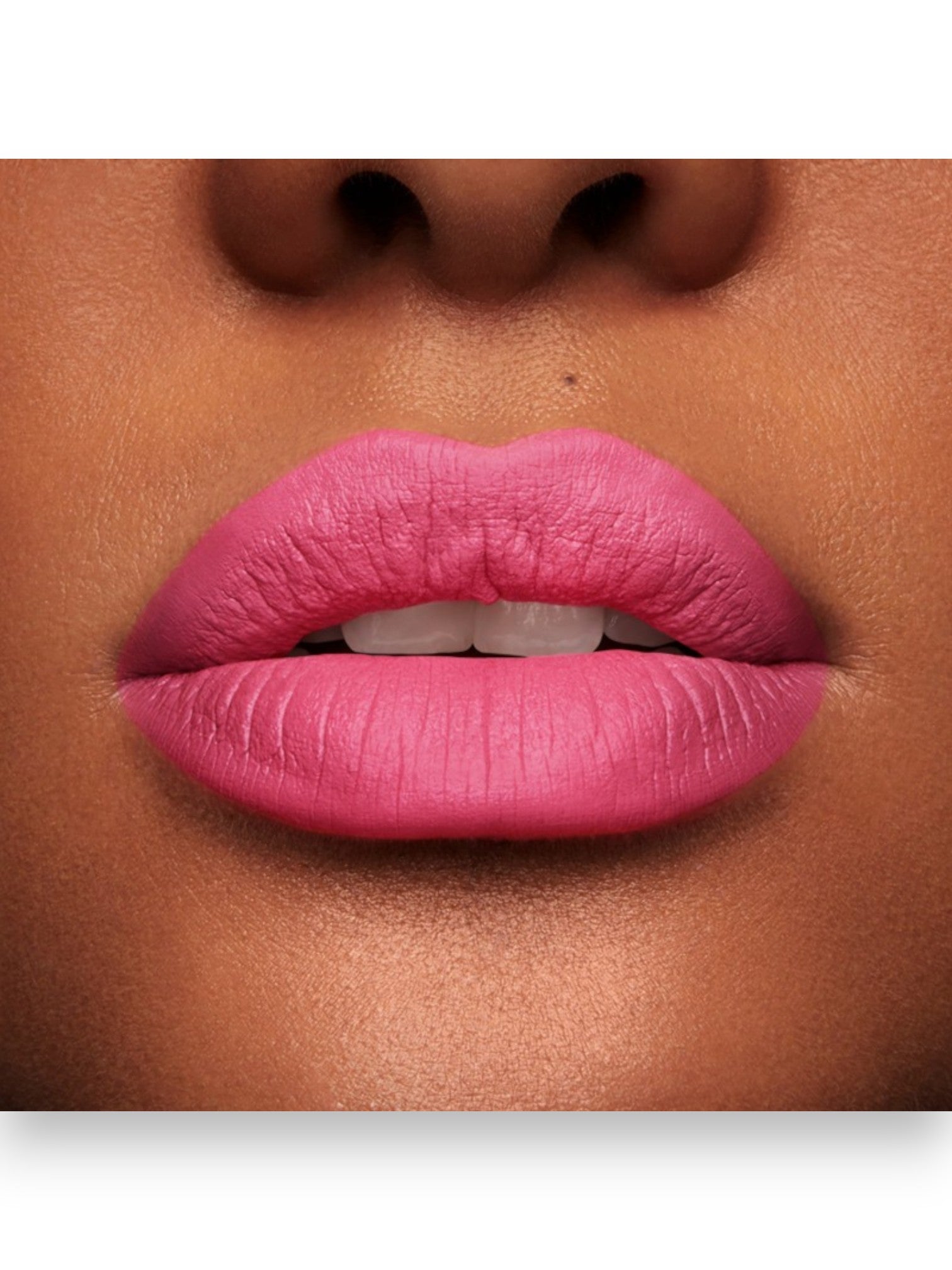 Close-up of a person's lips wearing pink lipstick on a neutral background. lancome, Monza Outlet, Monza Fashion, Shein Outlet
