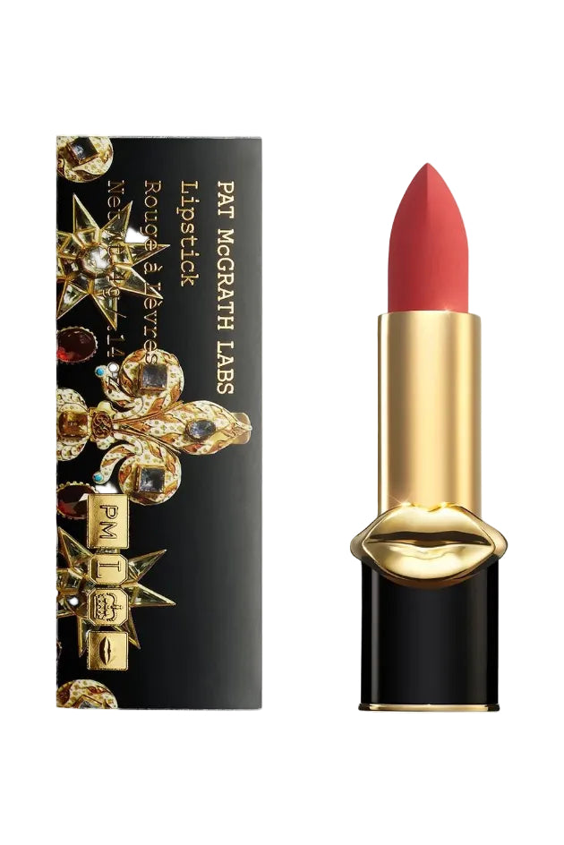 Red lipstick with black and gold case on white background. Monza Outlet