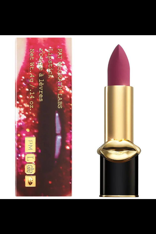 Lipstick with gold cap and colorful packaging on white background Monza Outlet