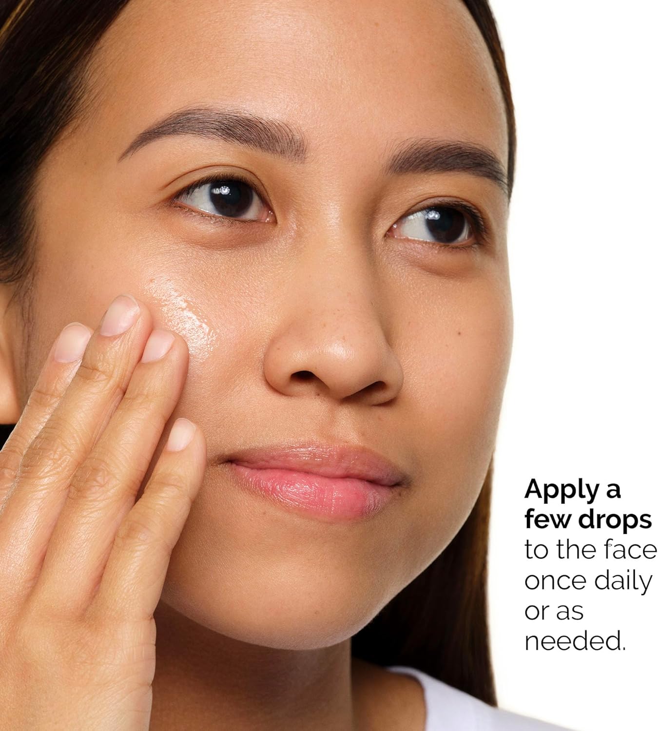 Woman applying a skincare product to her face with text on how to use it. Monza fashion outlet, monza outlet, shein outlet, shien outlet cosmetics, makeup, perfume