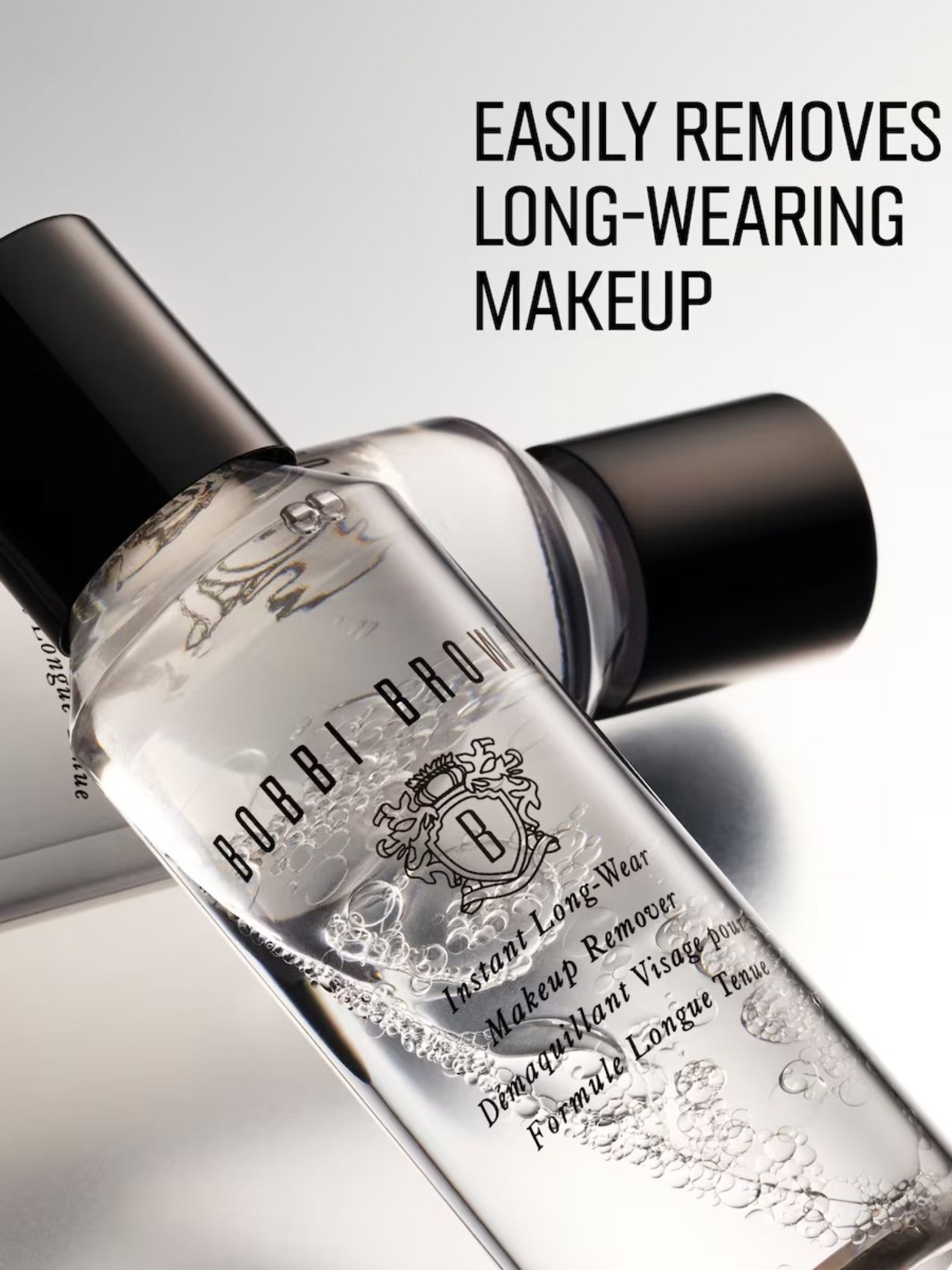 Bobbi Brown makeup remover bottle with text on a reflective surface. Bobbi Brown, Monza Outlet, Monza Fashion, Shein Outlet