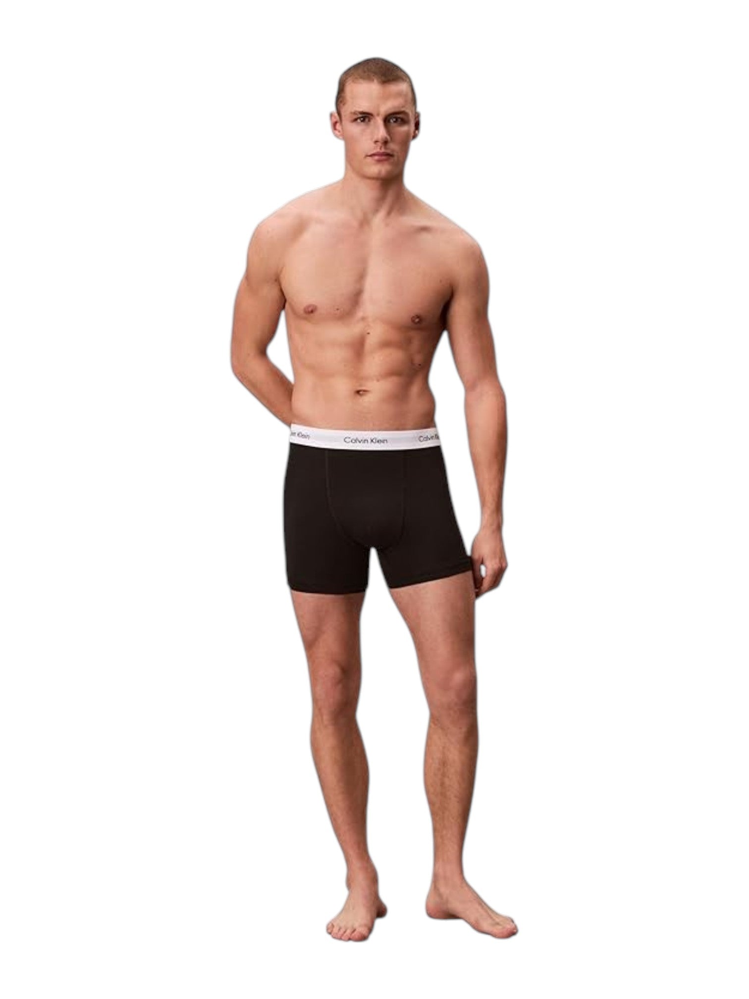 Man wearing black boxer briefs with a white waistband on a white background. Calvin Klein, Monza Outlet, Monza Fashion, Shein Outlet