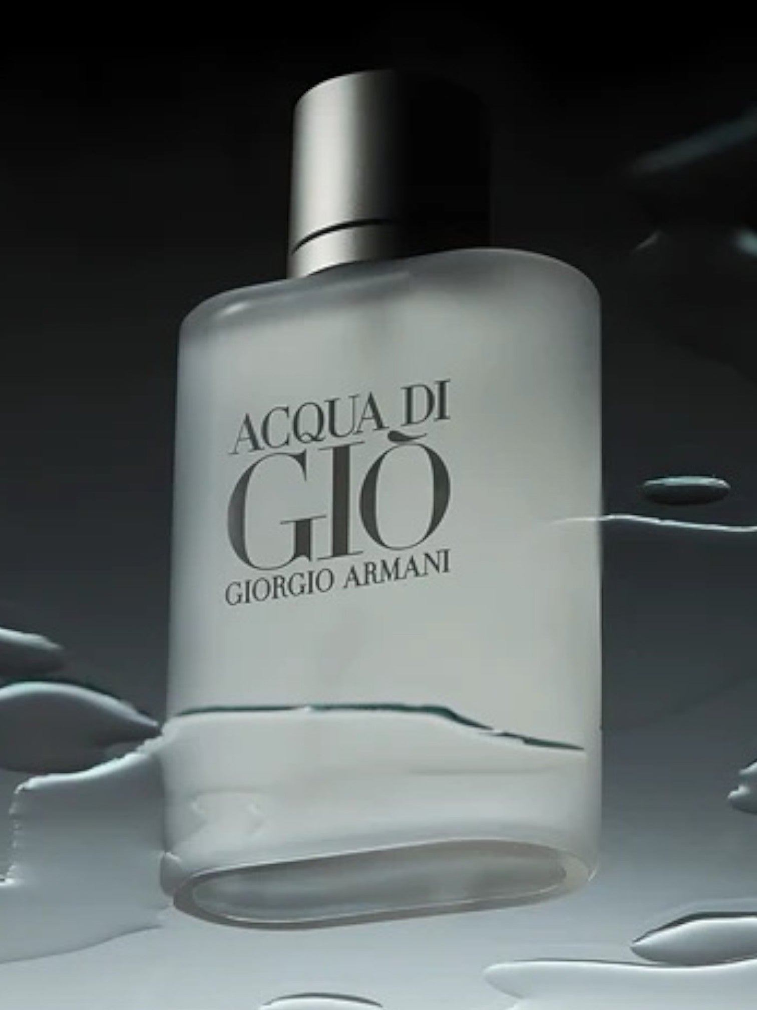 Giorgio Armani Acqua di Giò perfume bottle on a dark background. Giorgio Armani, Monza Outlet, Monza Fashion, Shein Outlet
