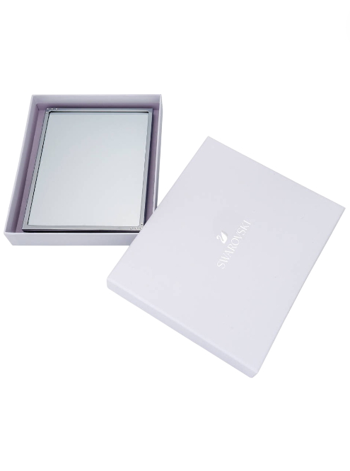 White jewelry box with a mirror on a white background