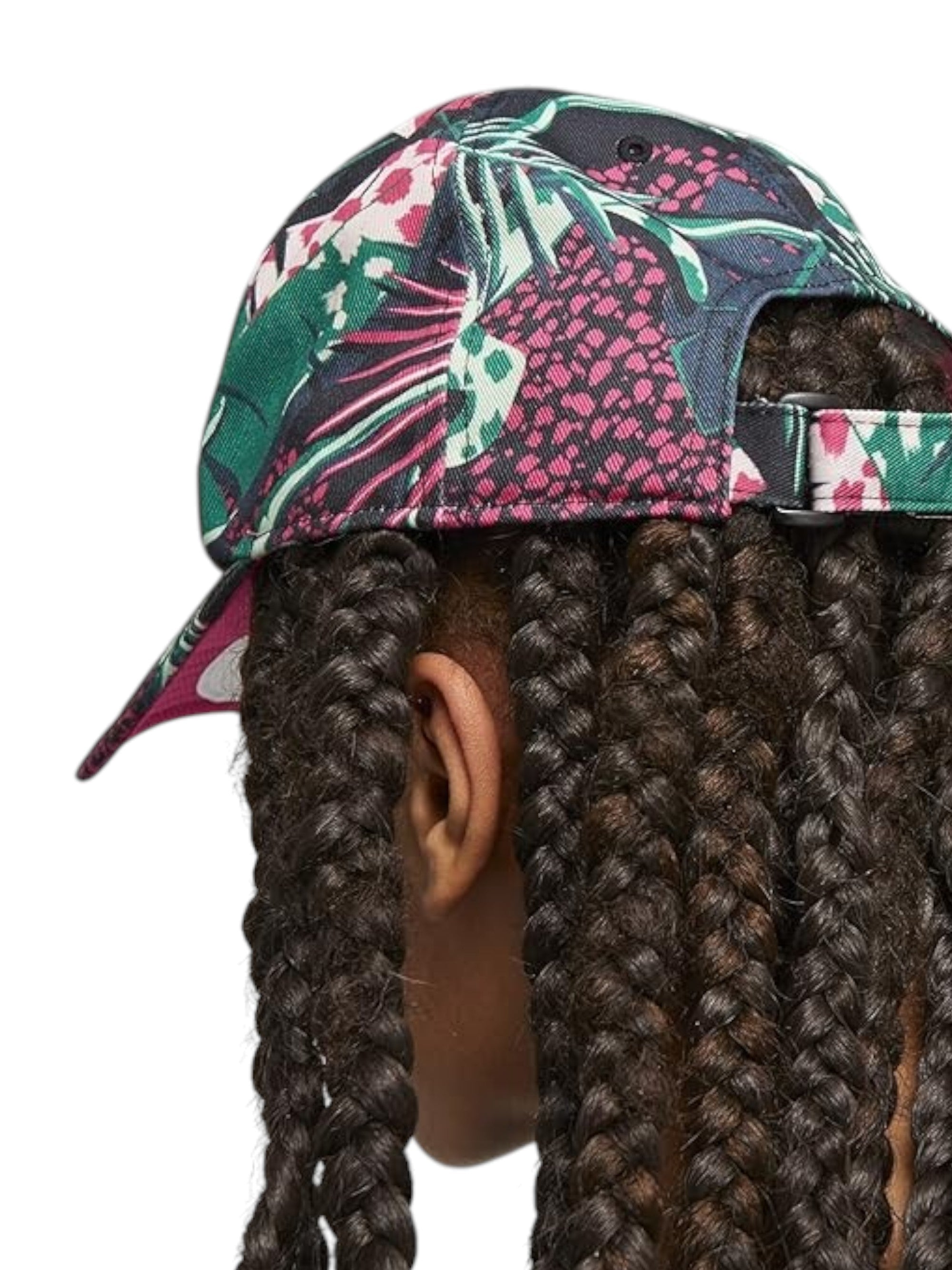 Person wearing a colorful floral cap with braided hair on a white background monza outlet, Shein outlet, monza fashion