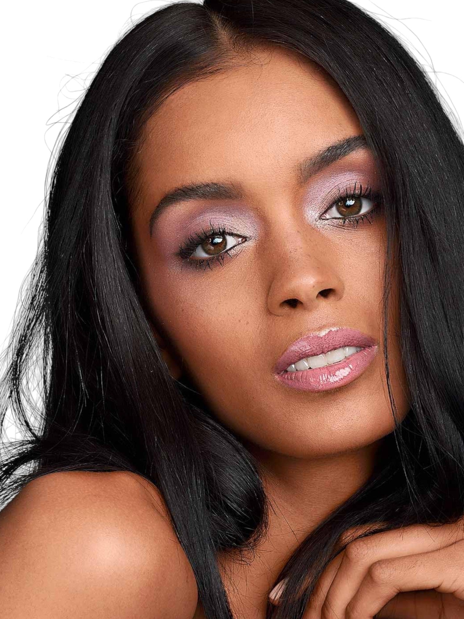 Close-up of a woman with dark hair and makeup on a white background Maybelline Monza Outlet