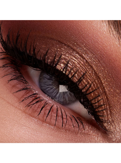 Close-up of an eye with dark eyeliner and a white background. Pat McGrath Labs Monza Outlet