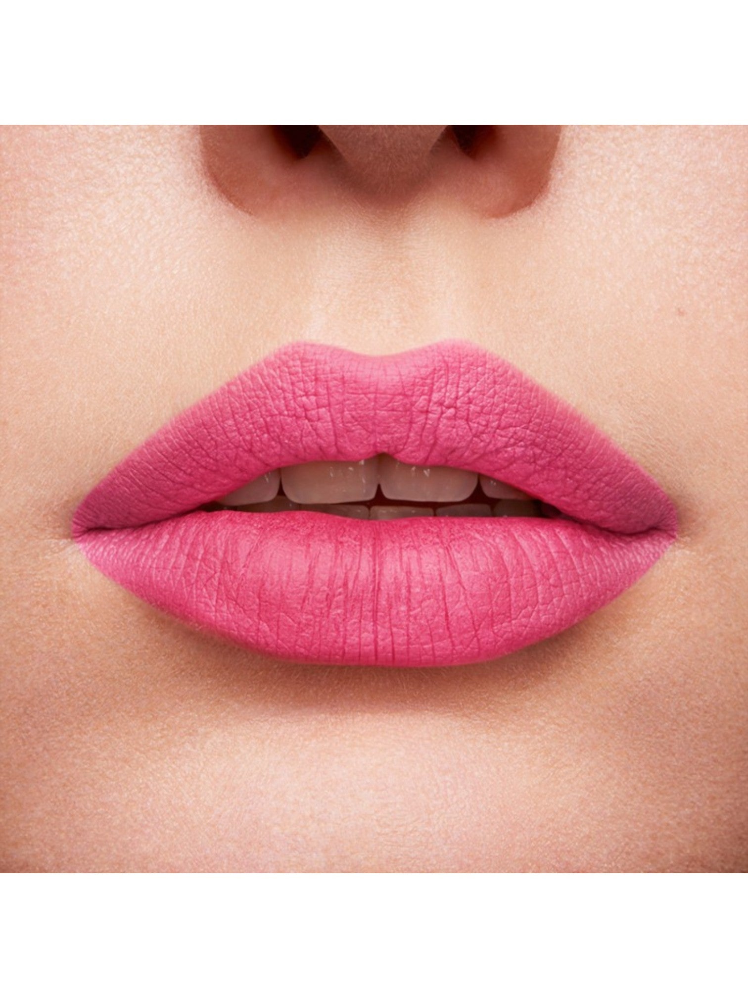 Close-up of a person wearing bright pink lipstick on a neutral background. lancome, Monza Outlet, Monza Fashion, Shein Outlet