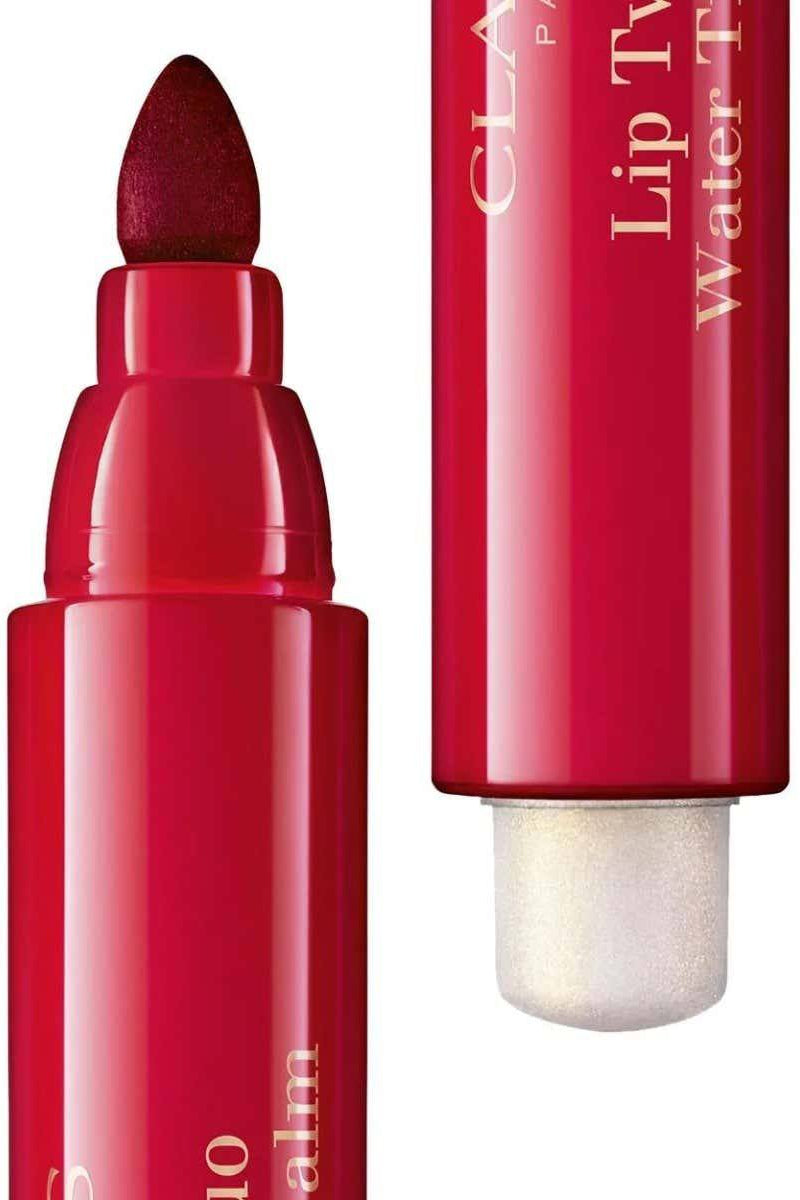 Red lip balm with visible brand name on a white background Clarins Monza Outlet
