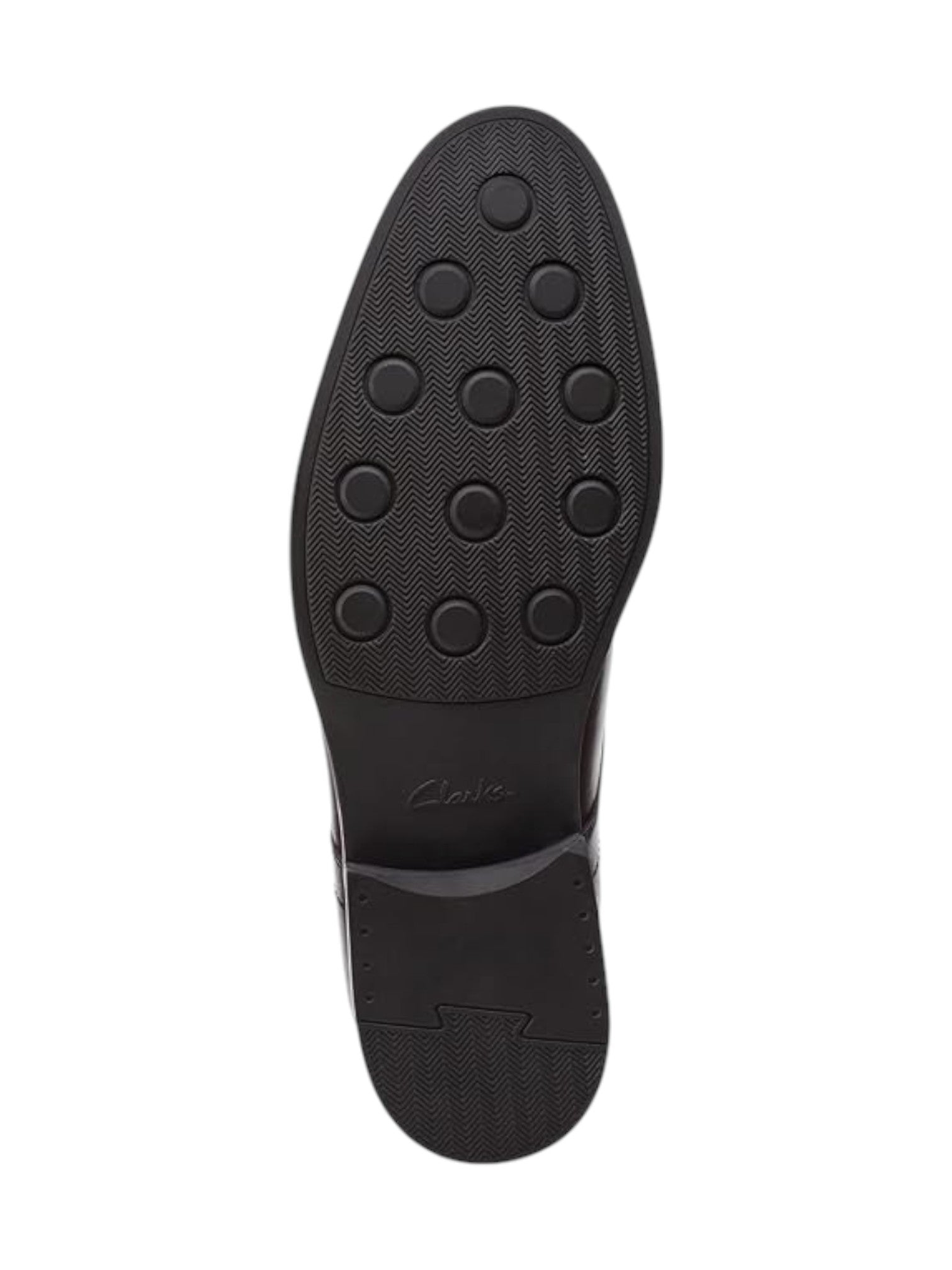 Black shoe sole with tread pattern on a white background. Clarks, Monza Outlet, Monza Fashion, Shein Outlet