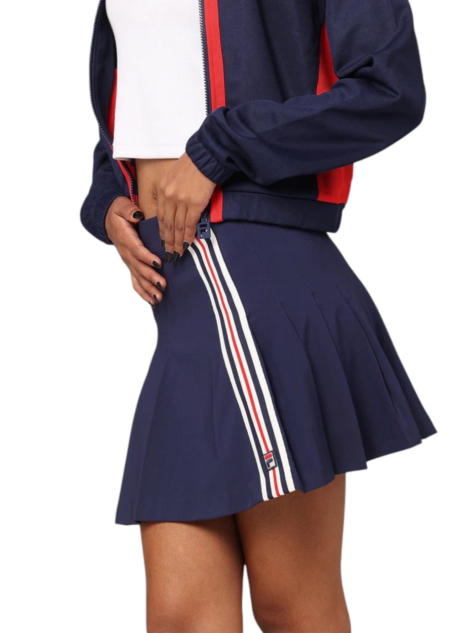 Navy blue skirt with red, white, and blue stripes worn by a person on a white background. Fila, Monza Outlet, Monza Fashion, Shein Outlet