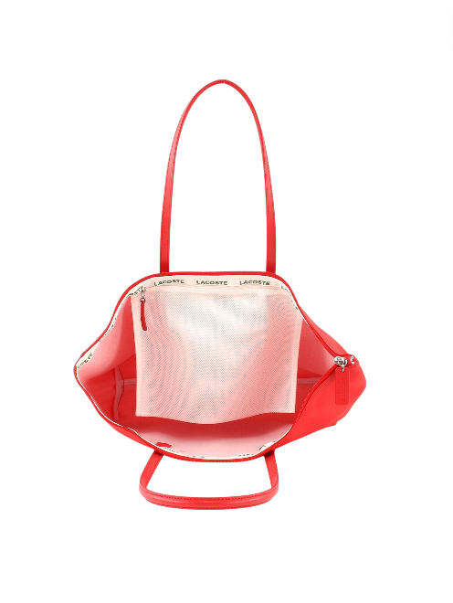 Red mesh bag with a clear plastic bag inside on a white background Lacoste Monza Outlet, Monza Fashion, Shein Outlet