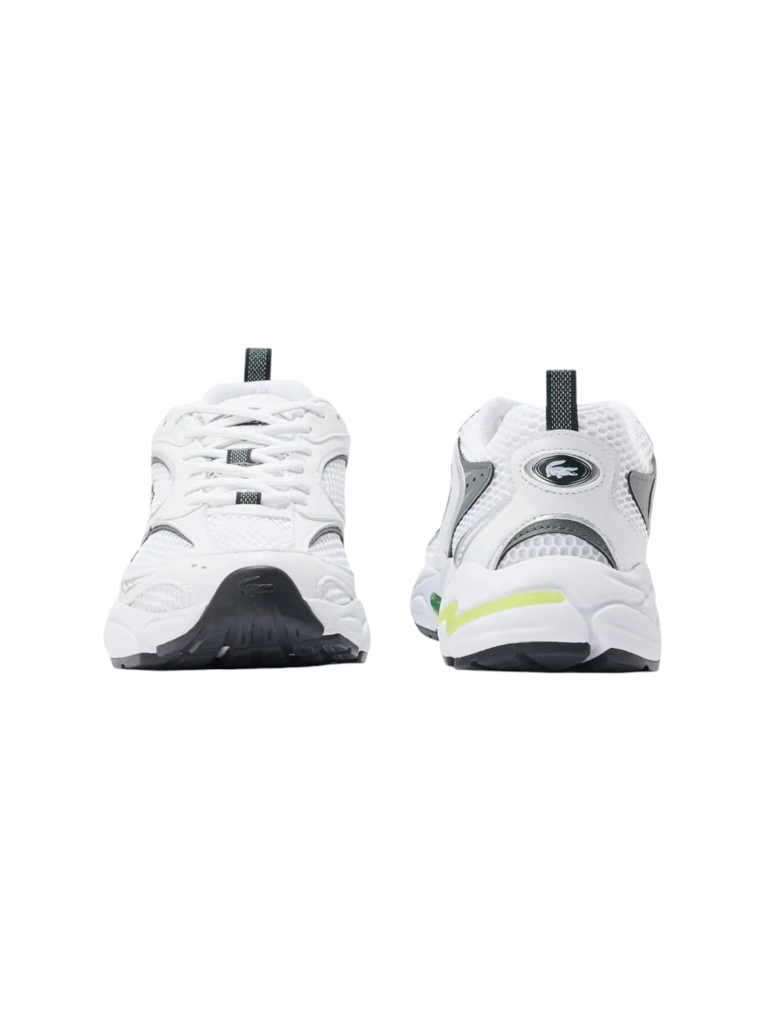 White sneakers with black soles and gray accents on a white background. Lacoste, Monza Outlet, Monza Fashion, Shein Outlet