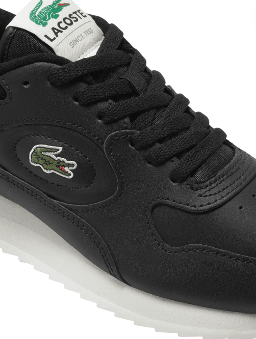 Black Lacoste sneaker with white sole on a white background Lacoste Monza Outlet