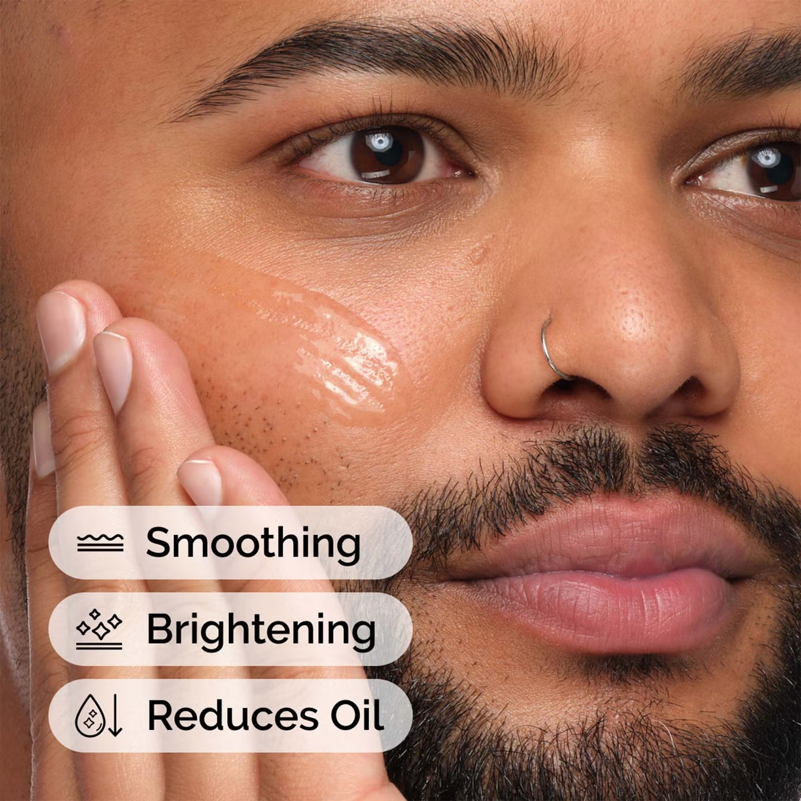 Close-up of a man's face with skincare product application, labeled for smoothing, brightening, and reducing oil. Monza fashion outlet, monza outlet, shein outlet, shien outlet cosmetics, makeup, perfume