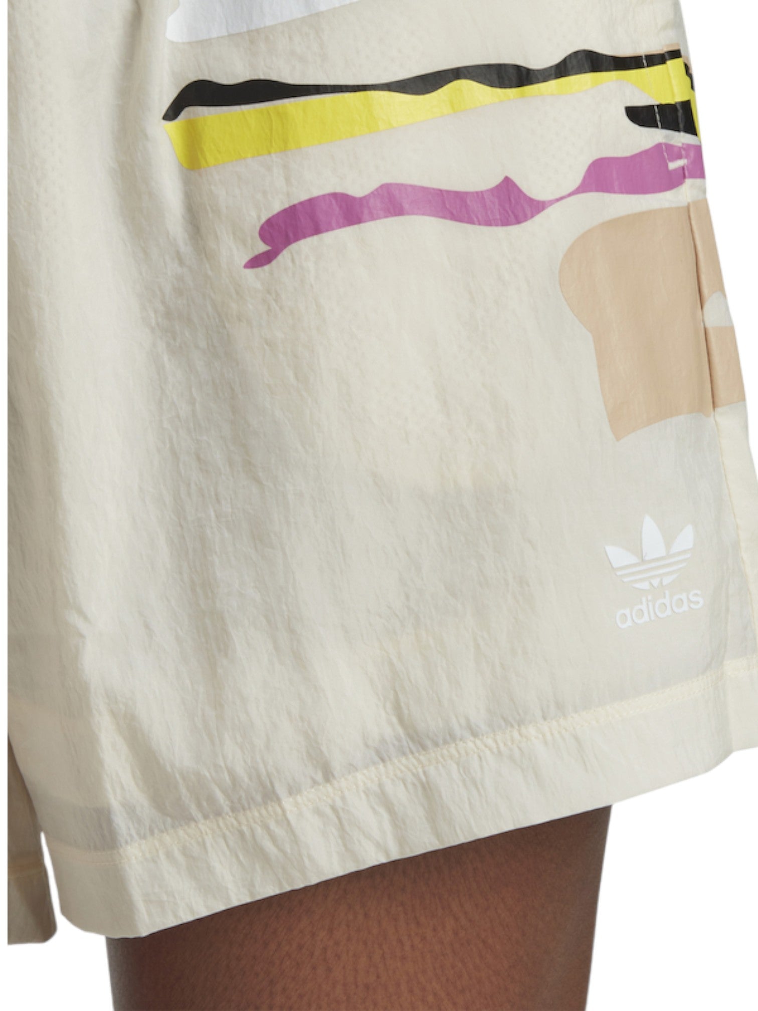 Beige shorts with colorful stripes and Adidas logo on a white background. Adidas, Monza Outlet, Monza Fashion, Shein Outlet