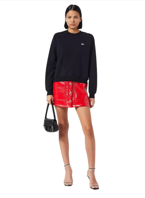 Woman wearing a black sweater and red leather skirt on a white background monza outlet, Shein outlet, monza fashion