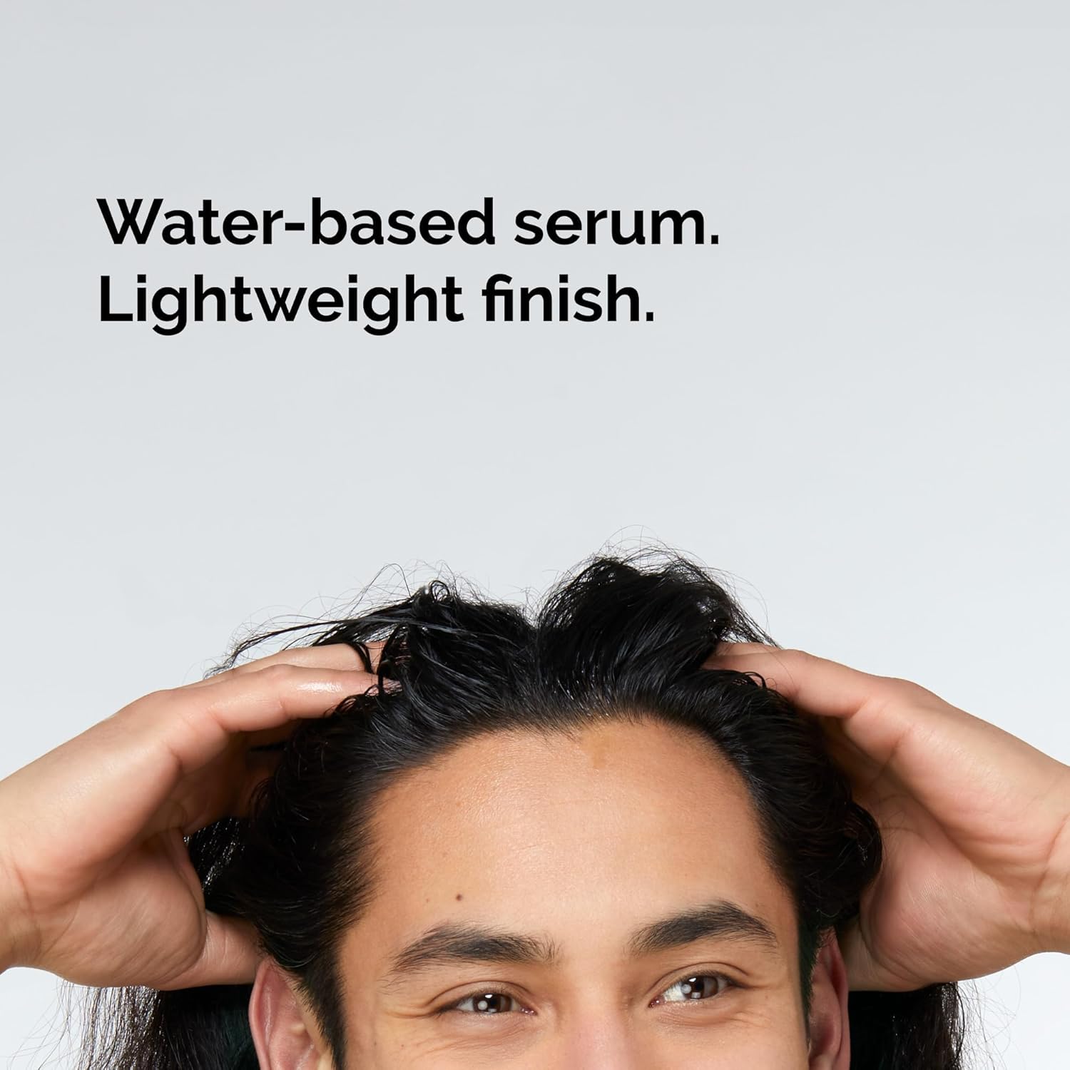 Person with styled hair against a gray background with text about water-based serum. Monza fashion outlet, monza outlet, shein outlet, shien outlet cosmetics, makeup, perfume