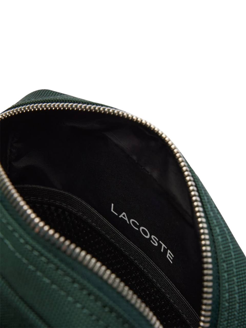 Green bag with Lacoste branding on a white background Lacoste Monza Outlet