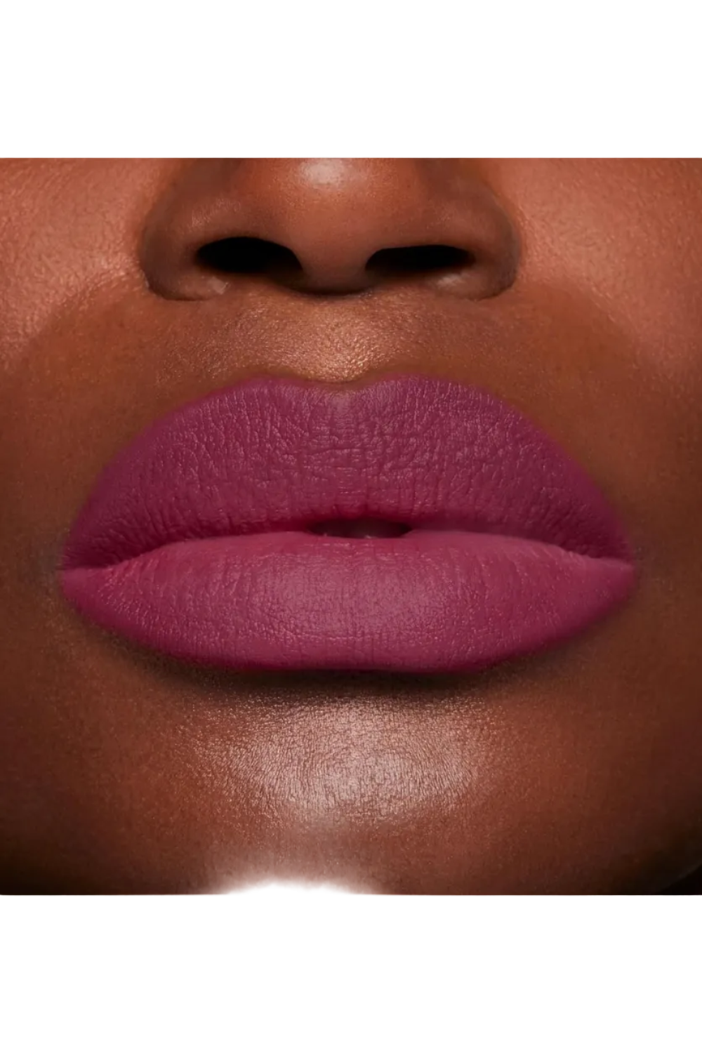 Close-up of a person's lips wearing a vibrant purple lipstick. Monza fashion outlet, monza outlet, shein outlet, shien outlet cosmetics, makeup, perfume