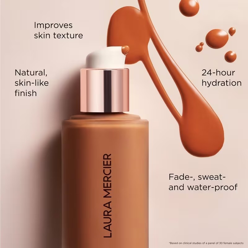 Laura Mercier skincare product with droplets and text highlighting benefits on a beige background Laura Mercier Monza Outlet