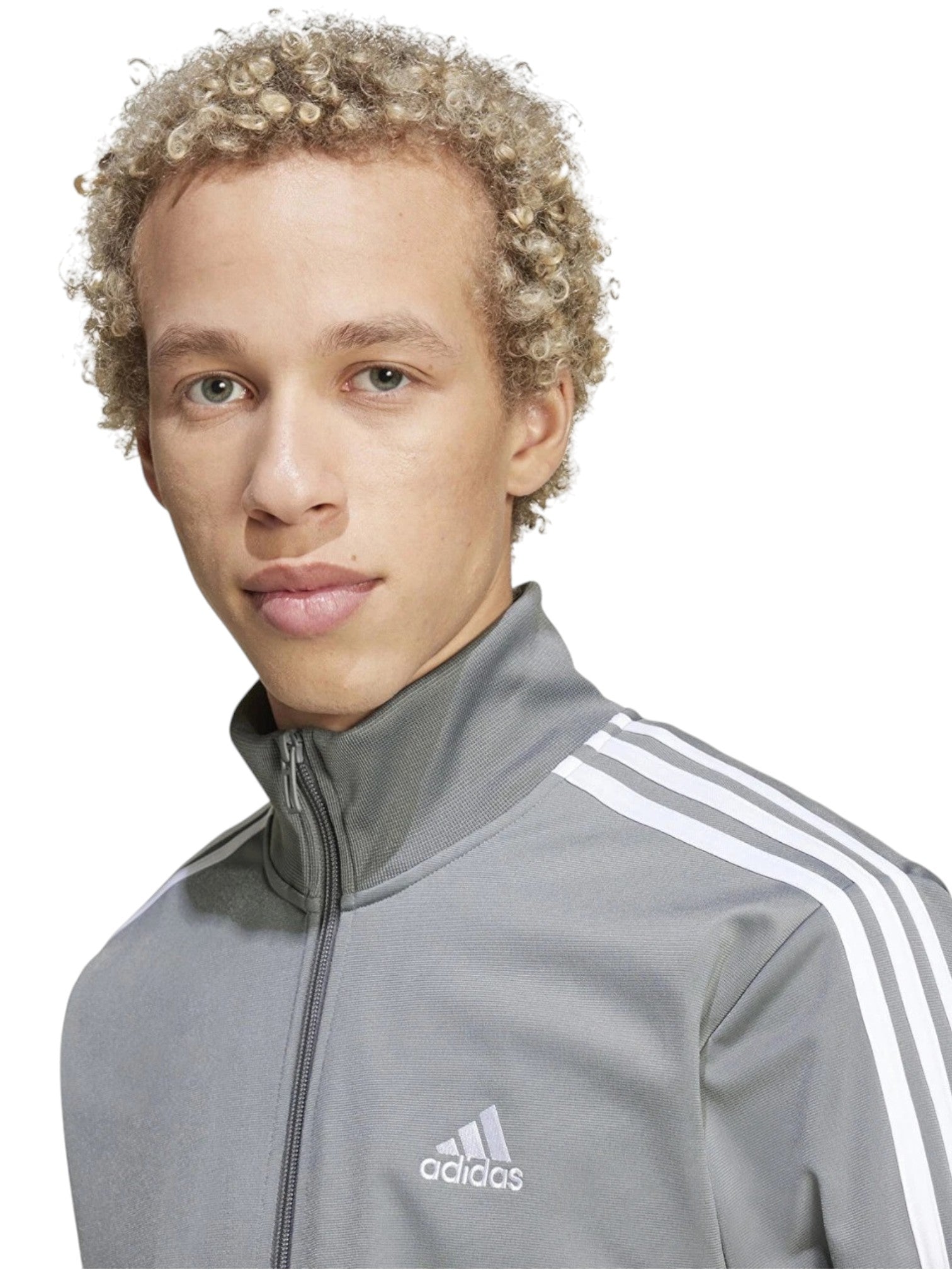 Person wearing a gray Adidas jacket with white stripes on a white background.Adidas, Monza Outlet, Monza Fashion, Shein Outlet