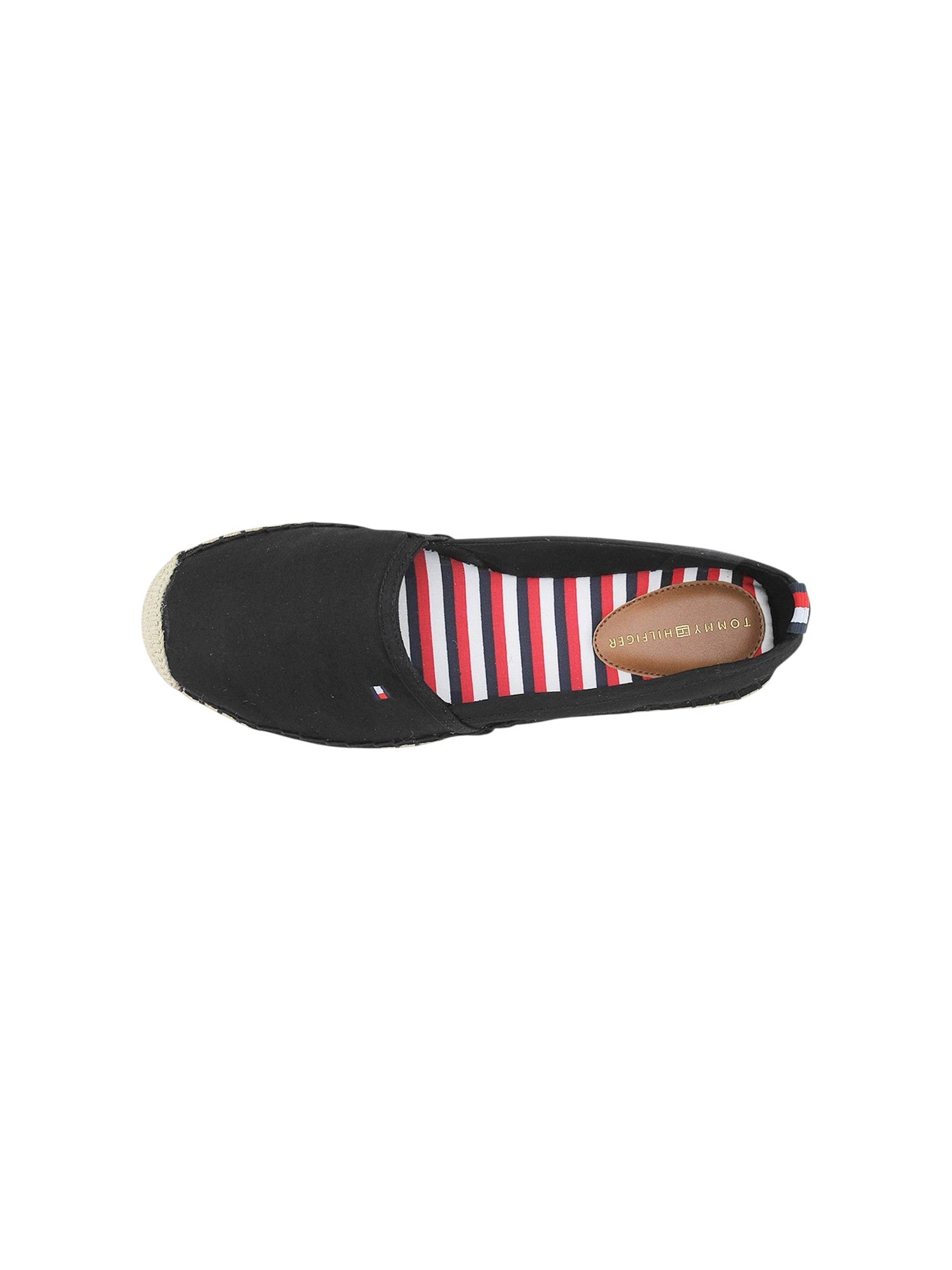 A single black slip on espadrille shoe shown from a top down view, featuring a red, white, and blue striped insole and a tan footbed. Tommy Hilfiger, Monza Outlet, Monza Fashion, Shein Outlet